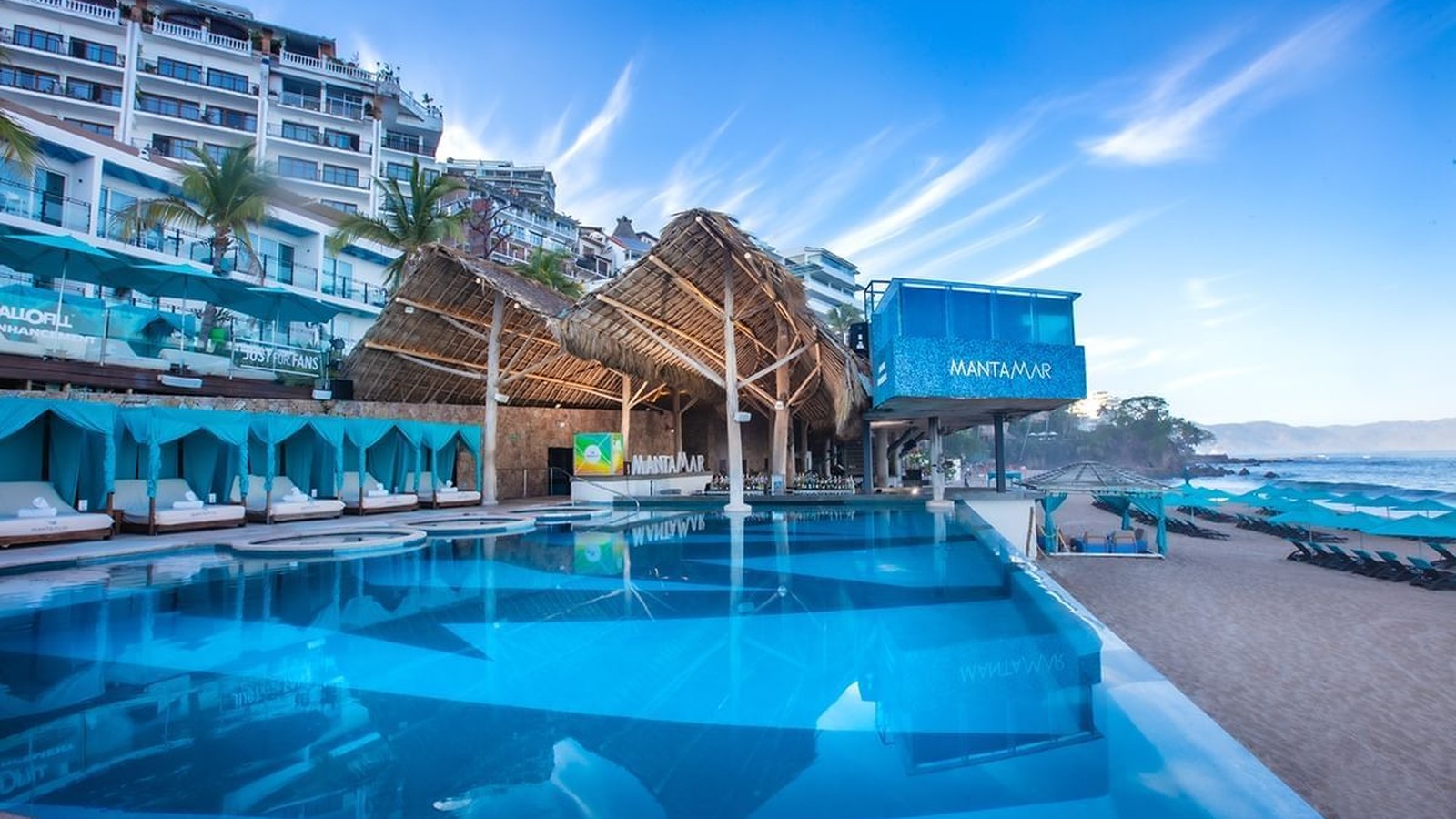 Almar Resort and Mantamar area pool terrace overlooking Banderas Bay in Puerto Vallarta