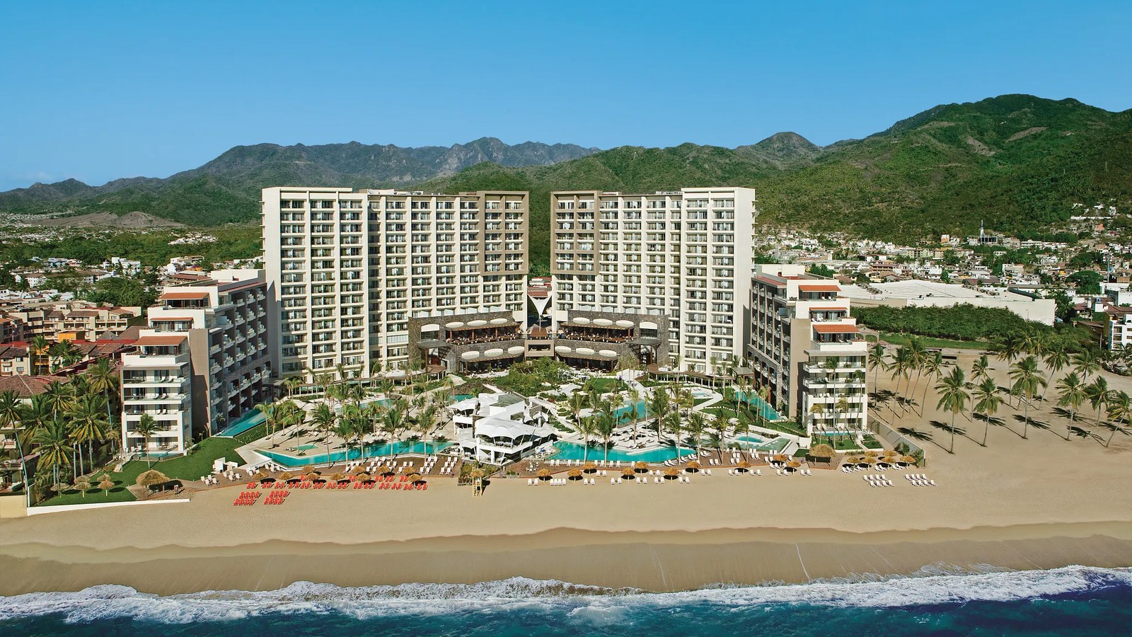 Dreams Vallarta Bay beachfront resort in Puerto Vallarta with ocean, pools, and mountain views