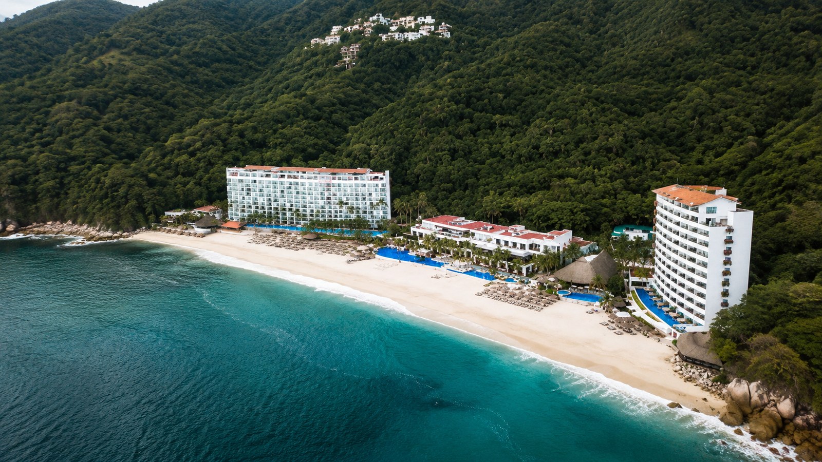 Hyatt Ziva Puerto Vallarta beachfront resort in a green hillside cove