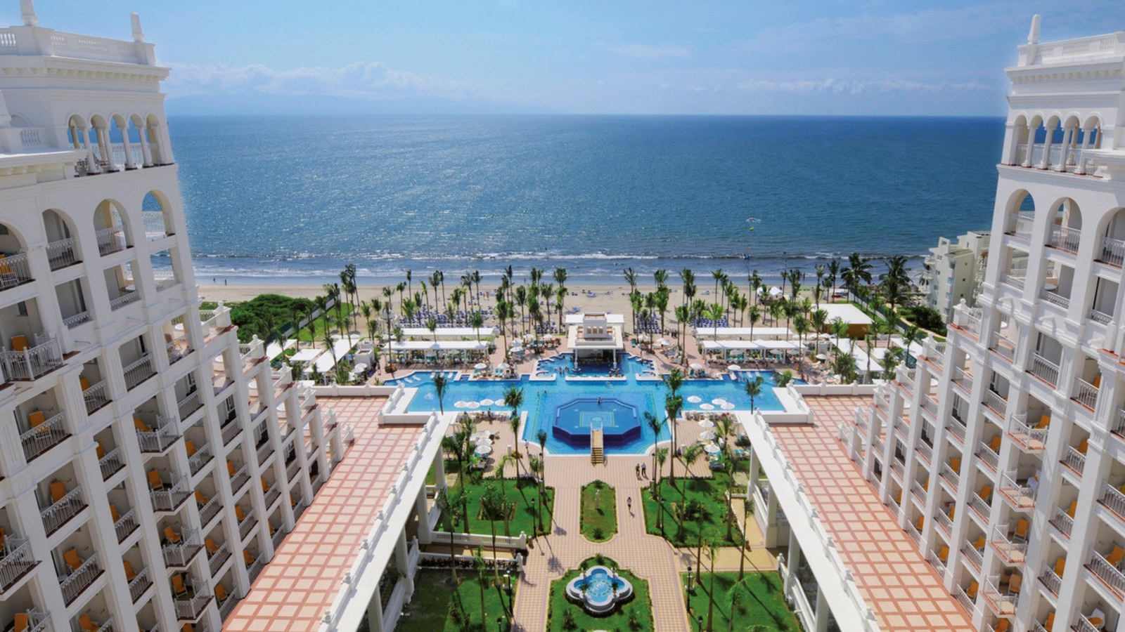 Riu Palace Pacifico beachfront resort in Riviera Nayarit near Puerto Vallarta with ocean, pools, and mountain views