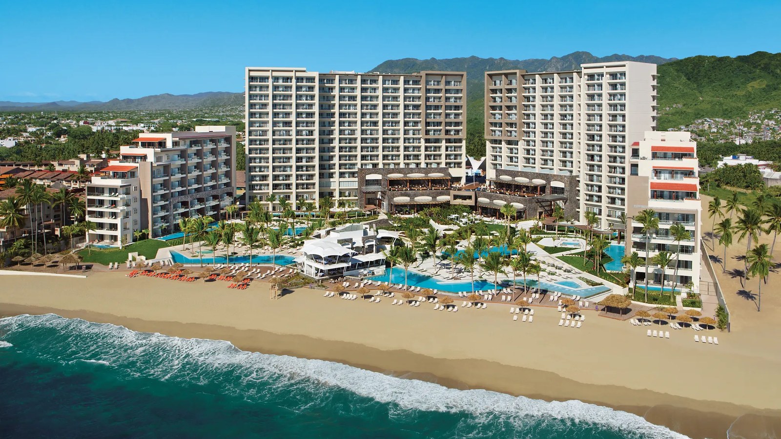 Secrets Vallarta Bay beachfront resort in Puerto Vallarta with ocean, pools, and mountain views