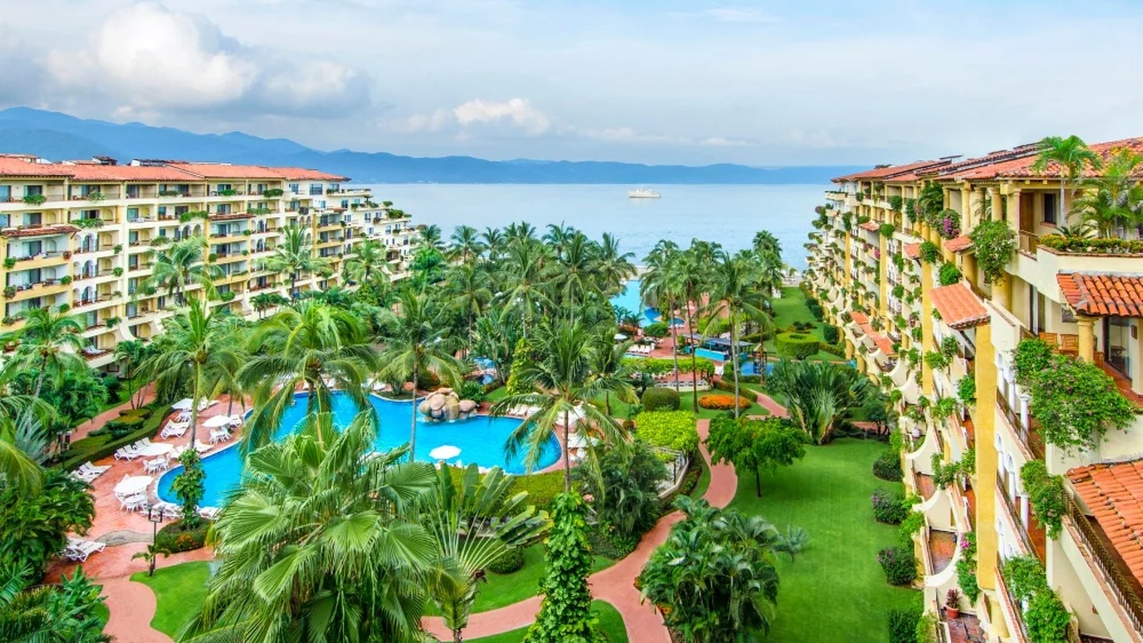 Velas Vallarta beachfront resort in Puerto Vallarta with pools, mountains, and ocean